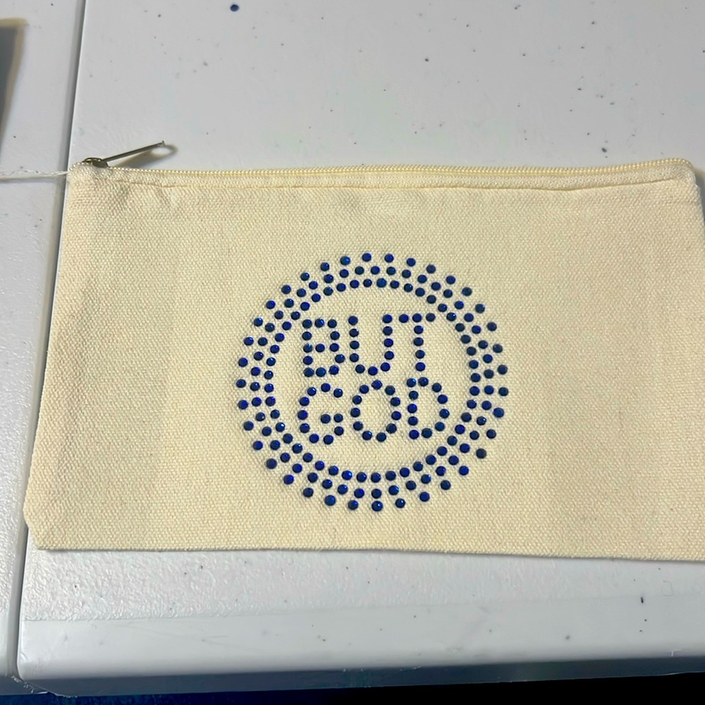 - Mini Zipper Bag – “BUT GOD” Rhinestone Design